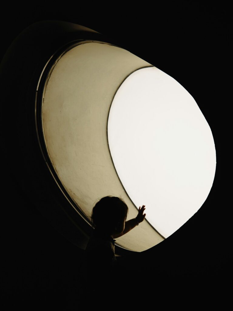 A Child looking into the Void with awe and uncertainty.